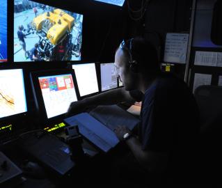 Operations manager Reuben runs through the pre-dive checklist from the van.