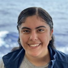 Guadalupe Zapata headshot in front of the ocean