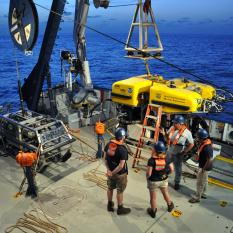 The deck team meets before we launch.