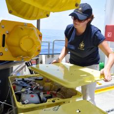 Senior scientist Beth opens up one of the sample boxes.