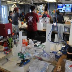 The team aboard Endeavor watches feeds from Nautilus in their lab.