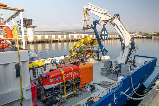 NUI on back deck of Nautilus with crane