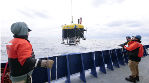 Mesobot vehicle being launched from ship